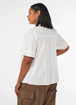 Bluse aus Baumwolle mit Zierbändern