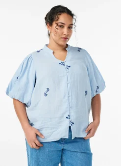 Bluse aus Baumwoll-Musselin mit Ballonärmeln und Stickereidetails