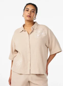 Bluse aus Baumwoll-Musselin mit gestickten Details