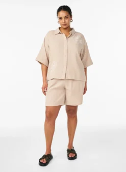 Bluse aus Baumwoll-Musselin mit gestickten Details