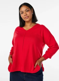 Bluse aus Feinstrick mit V-Ausschnitt und Detail auf der Vorderseite