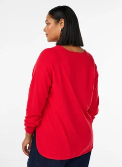 Bluse aus Feinstrick mit V-Ausschnitt und Detail auf der Vorderseite