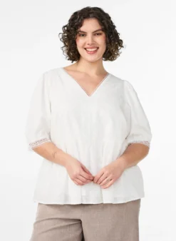 Bluse aus strukturierter Baumwolle mit Häkeldetails