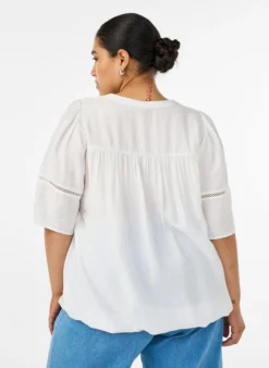 Bluse aus Viskose mit Biesen und Ballonärmeln