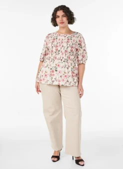 Bluse aus Viskose mit Smock und Peplum-Effekt