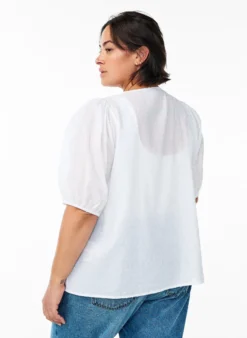 Bluse mit Bindeband und gepunkteter Textur