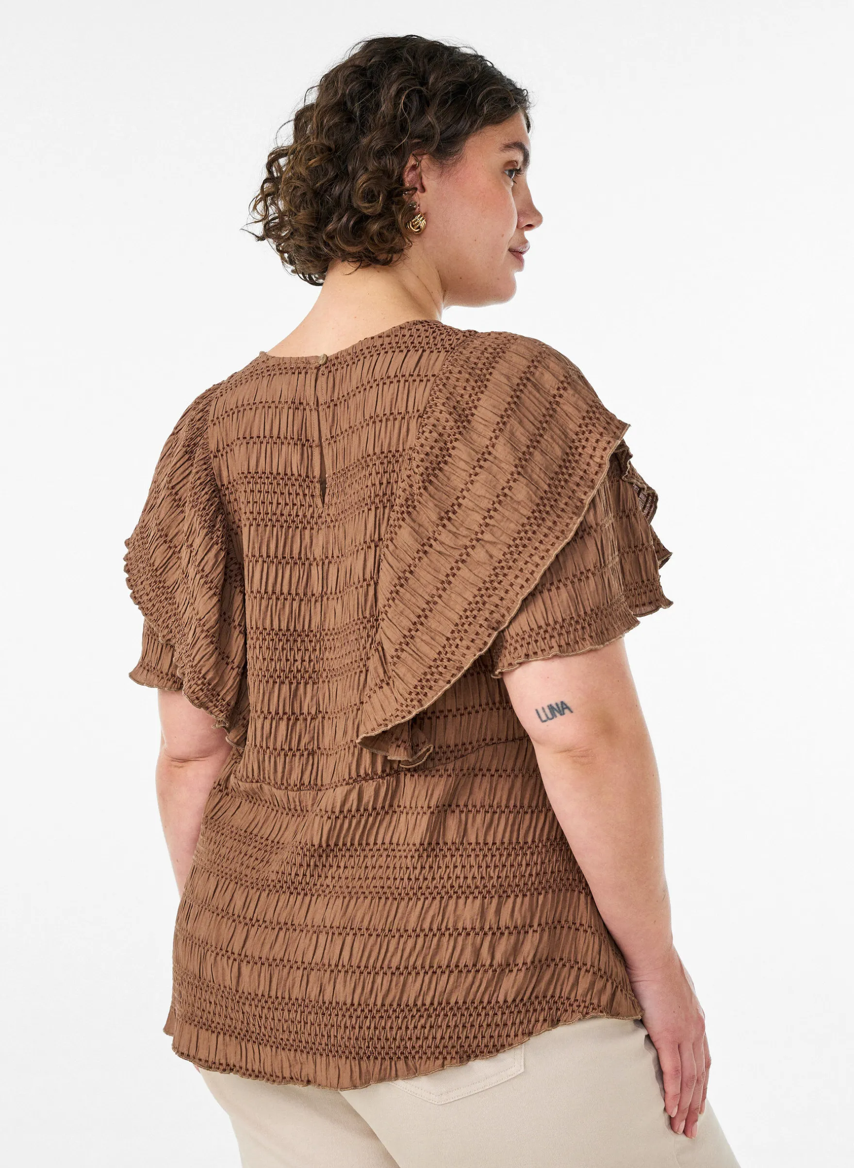 Bluse mit gesmokter Textur und Rüschenärmeln