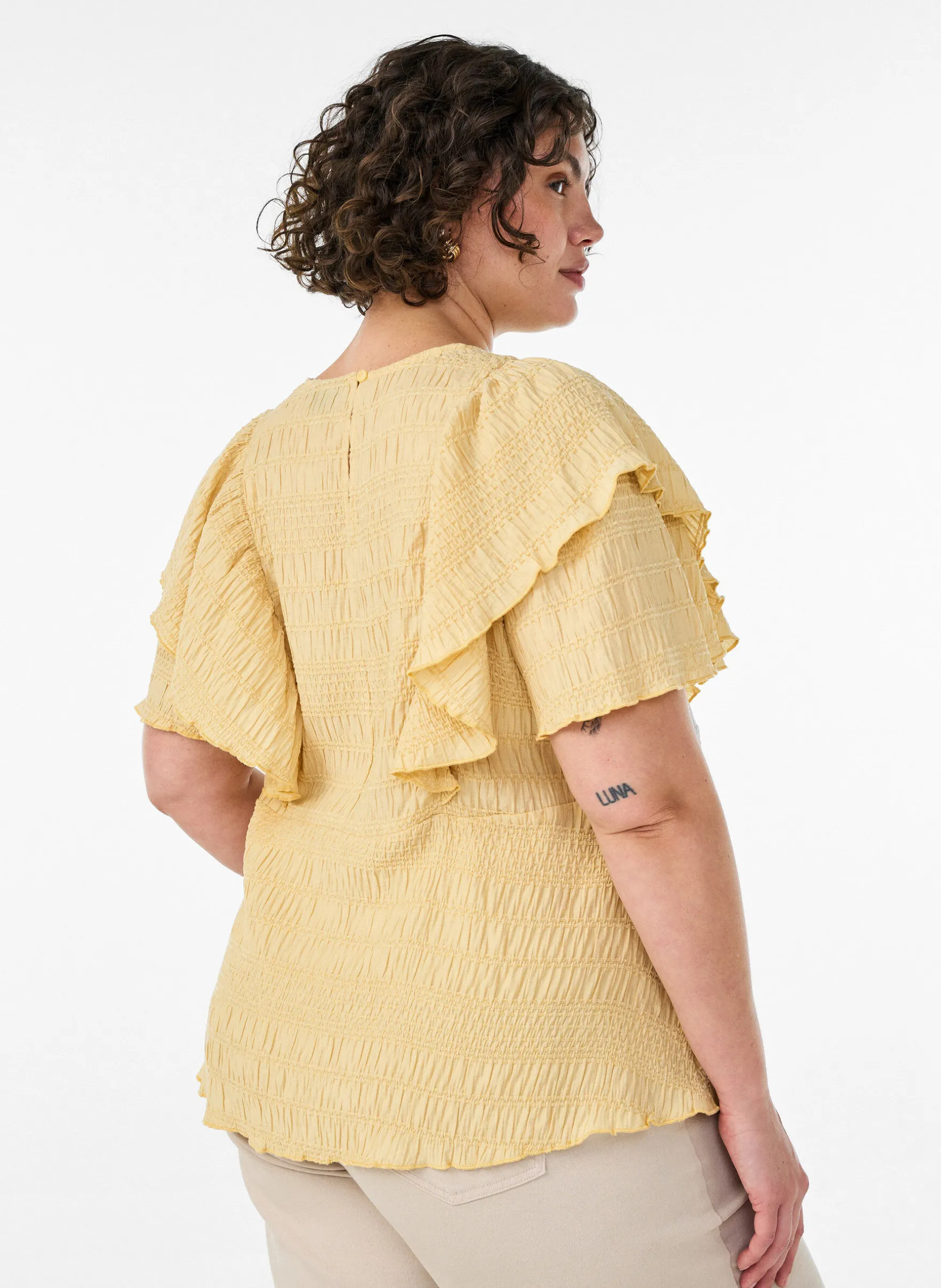 Bluse mit gesmokter Textur und Rüschenärmeln