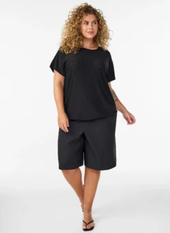 Bluse mit Lochstickerei und Ballonärmeln