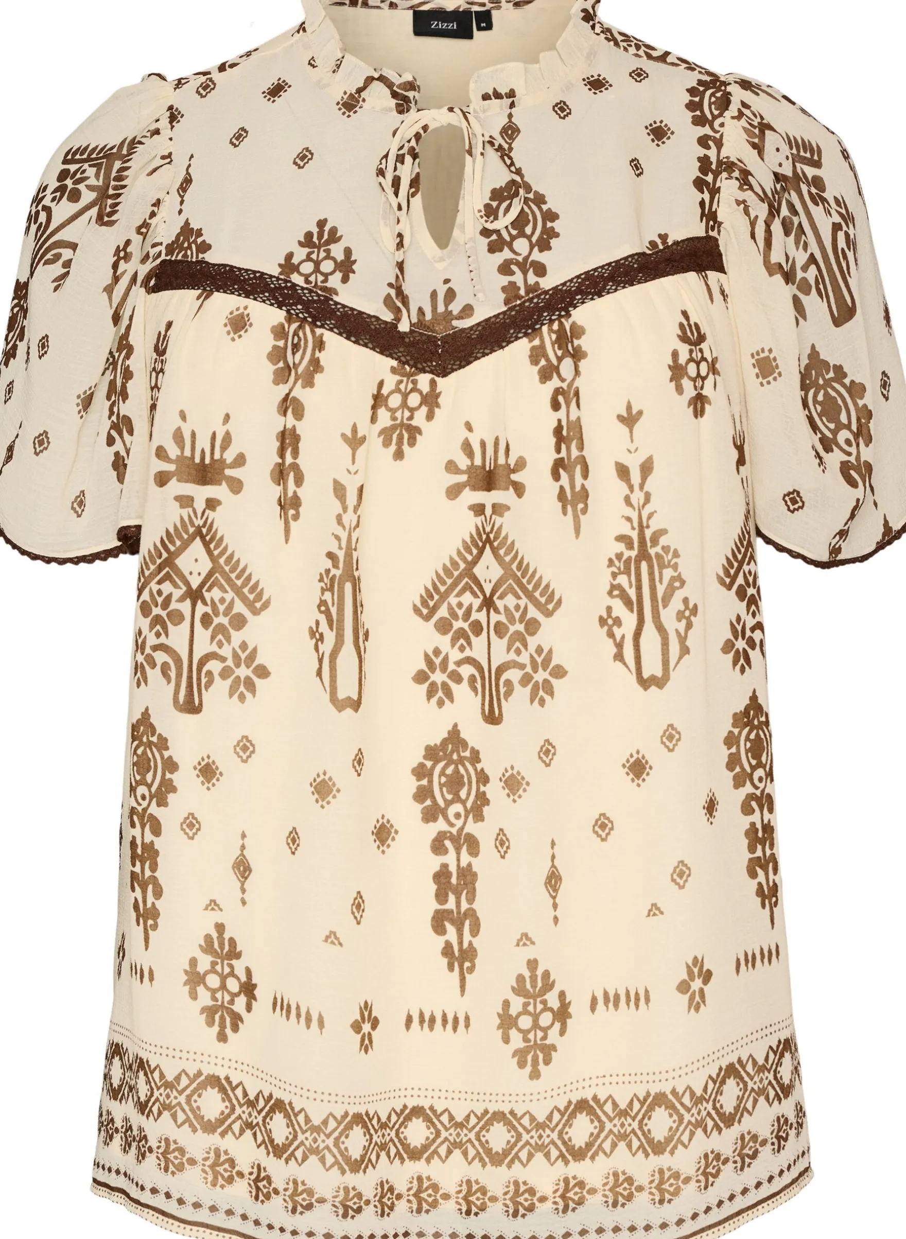 Bluse mit Muster und Häkelborte