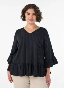 Bluse mit Struktur, V-Ausschnitt und Rüschen