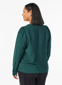Bluse mit V-Ausschnitt und bestickten Bändern