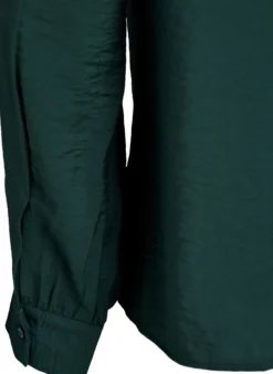 Bluse mit V-Ausschnitt und bestickten Bändern