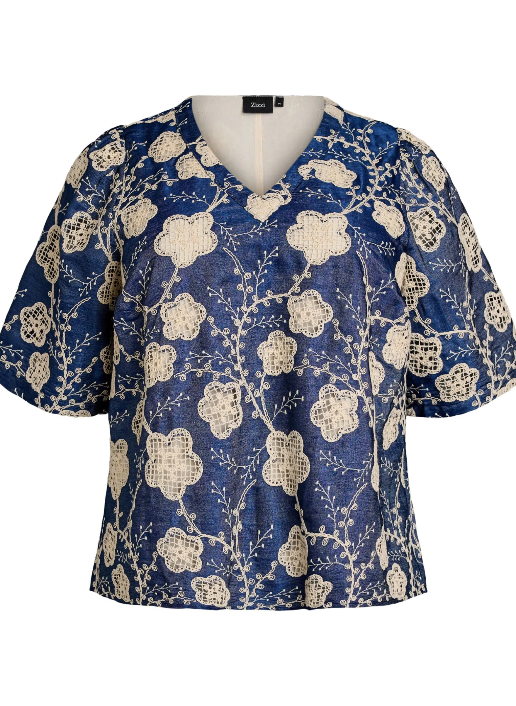 Bluse mit V-Ausschnitt und gesticktem Muster