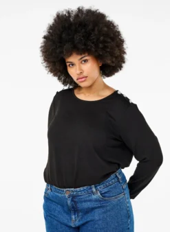 Bluse mit Zierknöpfen