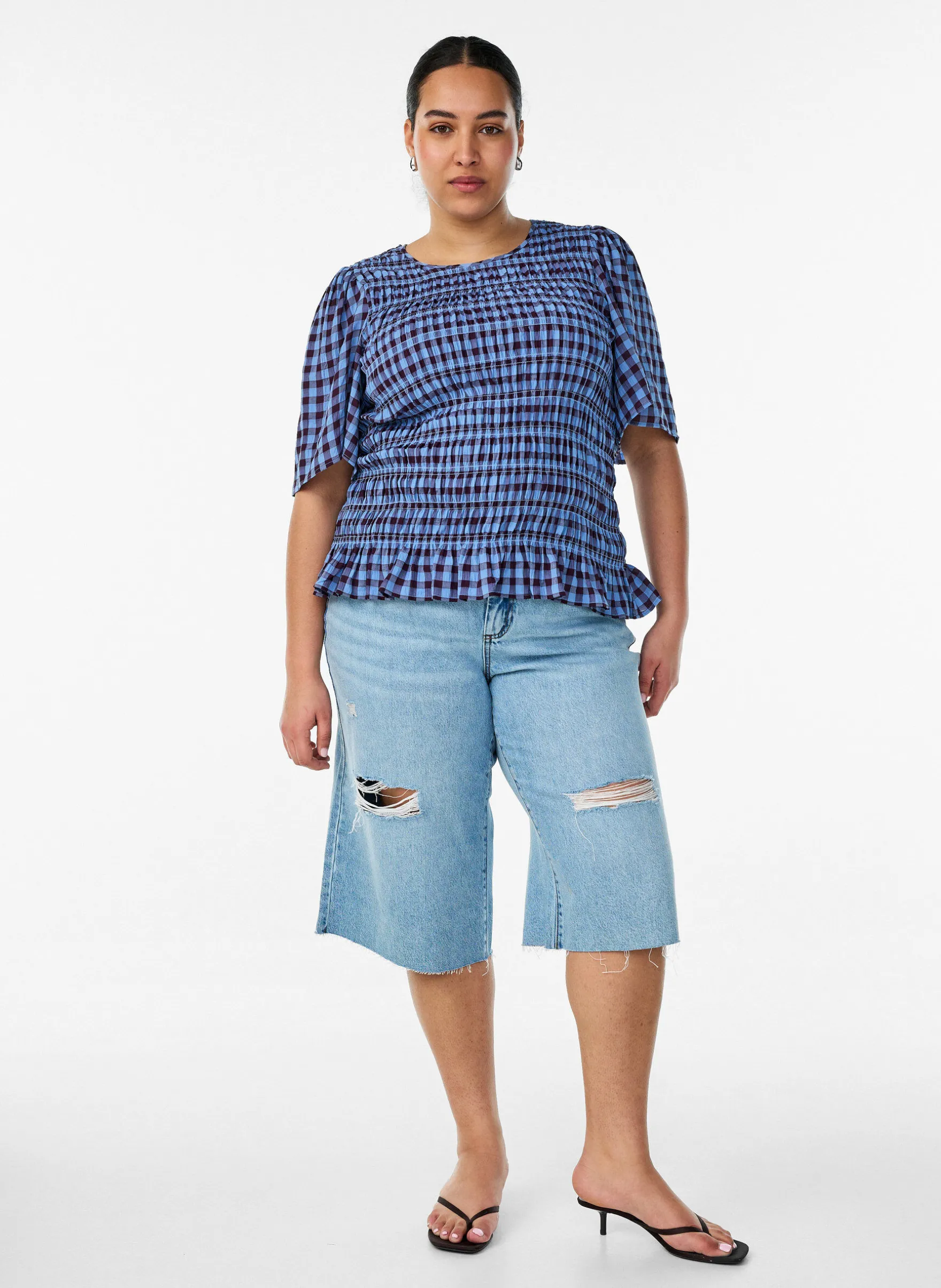 Cropped Jeans mit abgenutzter Optik und offenen Kanten