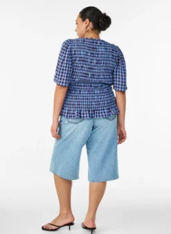 Cropped Jeans mit abgenutzter Optik und offenen Kanten