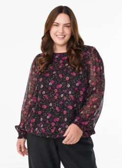 Geblümte Bluse aus Chiffon mit transparenten Ärmeln