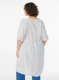 Gepunktetes Kleid mit V-Ausschnitt in A-Linie
