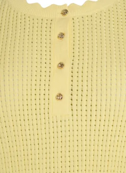 Kurzärmelige Strickbluse mit Lochmuster und Wellenkanten