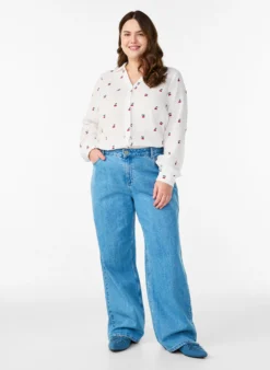 Langärmelige Bluse aus Baumwoll-Musselin mit bestickten Motiven