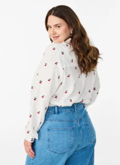 Langärmelige Bluse aus Baumwoll-Musselin mit bestickten Motiven
