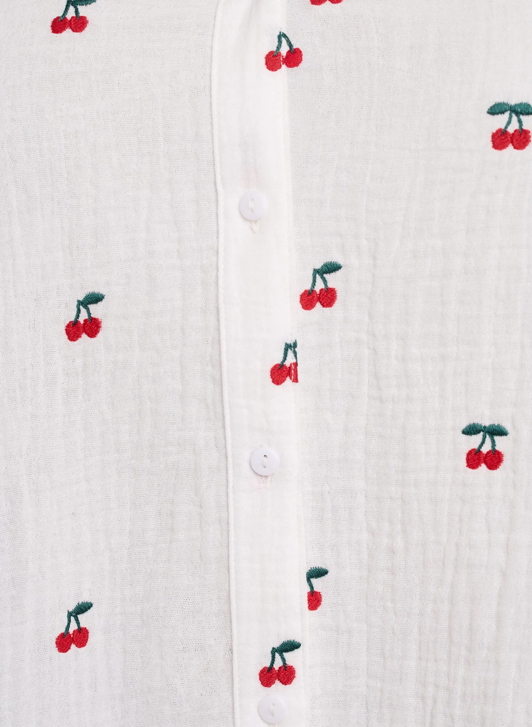 Langärmelige Bluse aus Baumwoll-Musselin mit bestickten Motiven