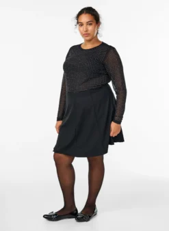 Meshbluse mit Strasssteinen und langen Ärmeln