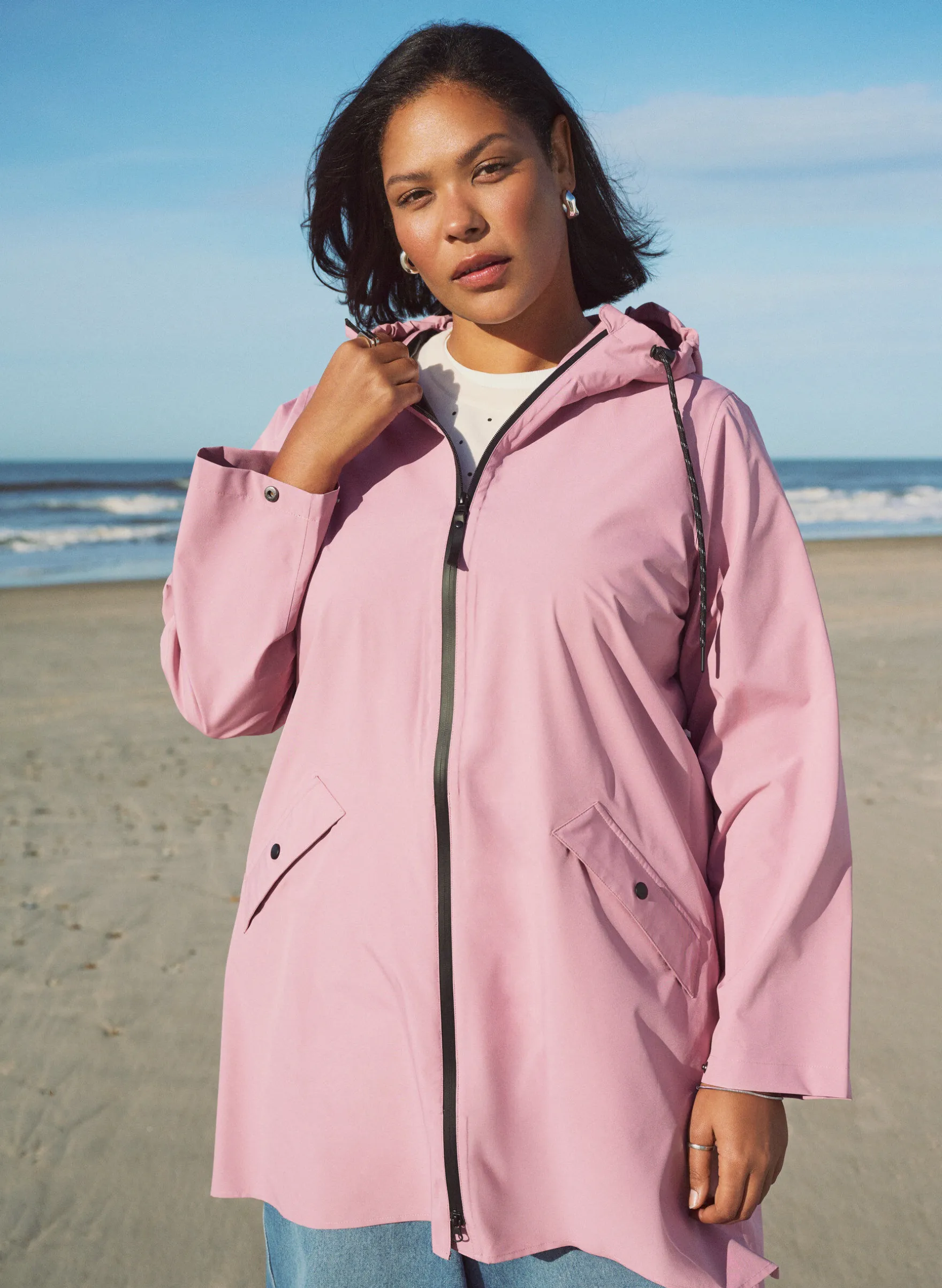 Regenjacke mit Taschen und Kapuze