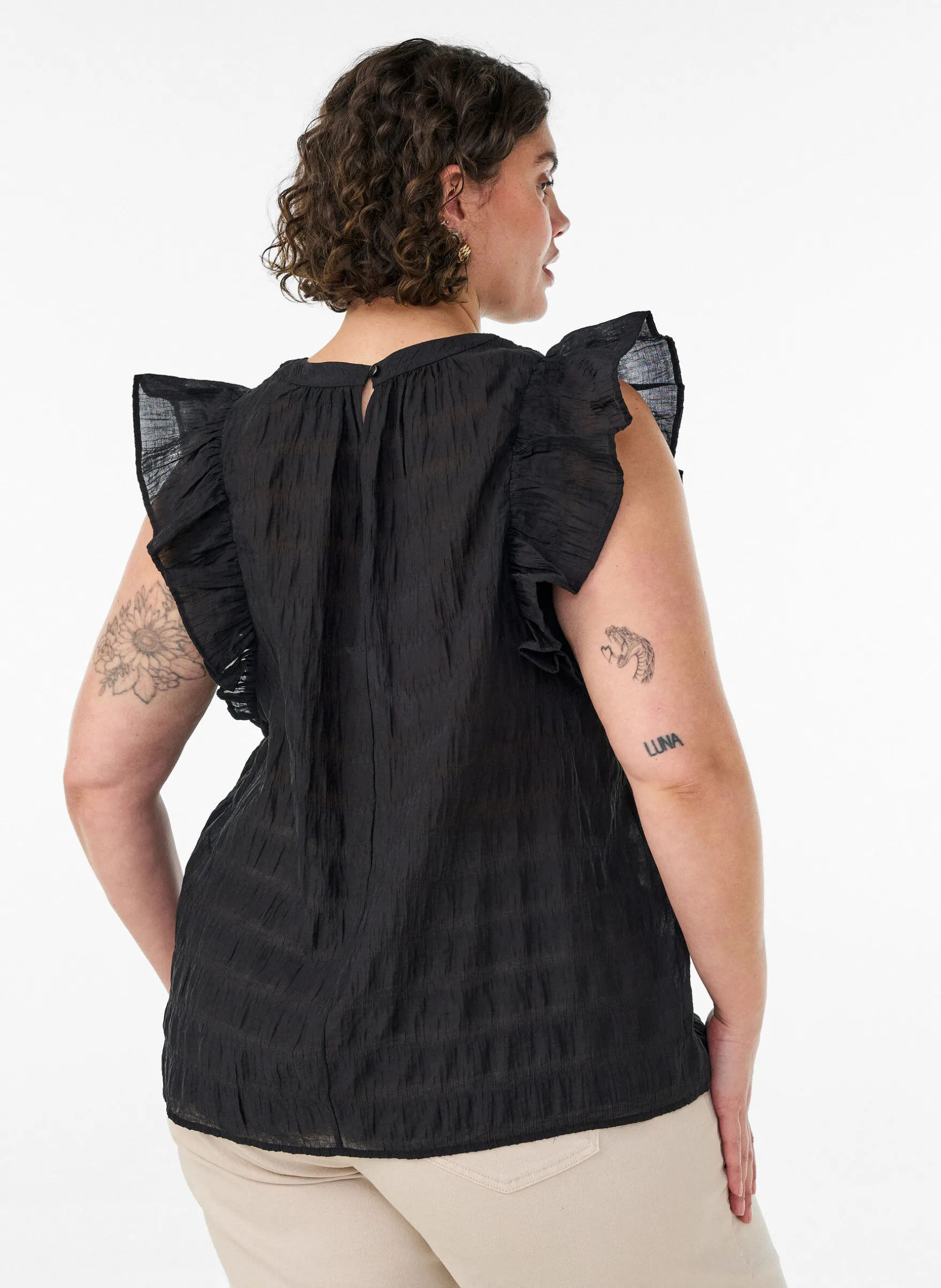 Ärmellose Bluse mit Struktur und Rüschen