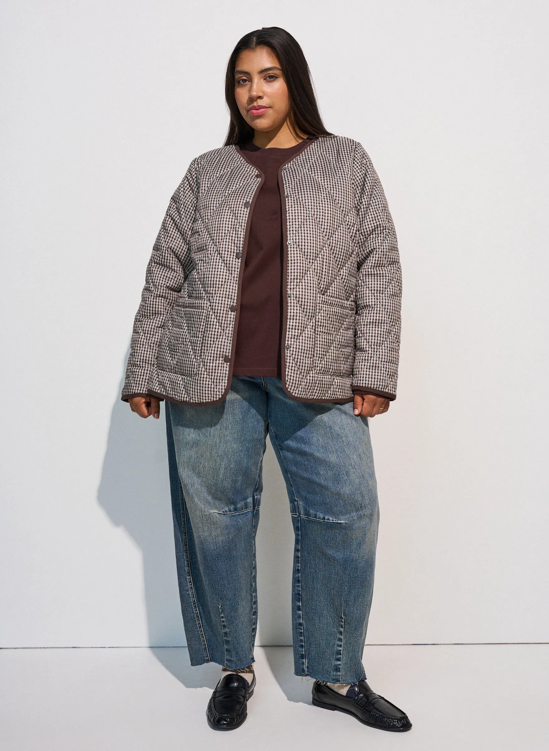Steppjacke mit kleinem Karomuster und Kontrastbesatz