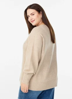 Strickbluse mit Strasssteinen