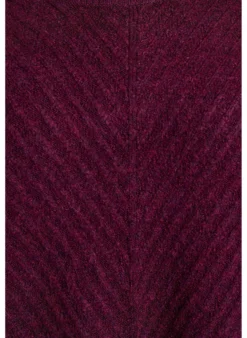 Strickbluse mit V-förmigem Rippenmuster und Schlitzen