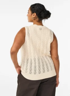 Strickweste mit Lochstickerei und Bindeband