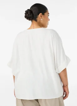Viskosebluse mit Crochet-Besatz und Knöpfen