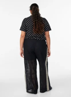 Weite Spitzenhose mit Kontraststreifen
