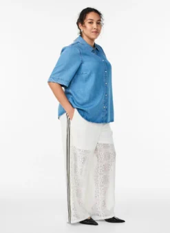 Weite Spitzenhose mit Kontraststreifen
